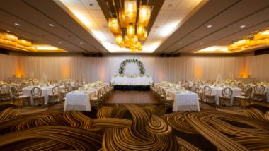 wide angle view of ballroom for wedding reception at Hollywood Casino Hotel at Greektown