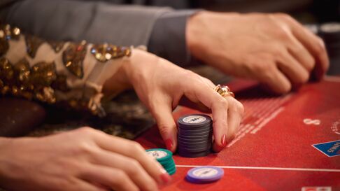 web-size-486x273-greektown-baccarat-scene02-group-712-f4.jpg