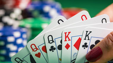 picture of a full house in poker playing cards